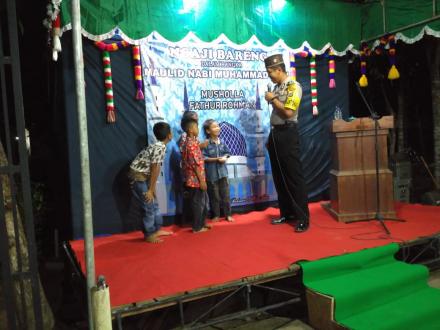 Bhabinkantibmas Desa Trimurti Hadiri Peringatan Maulid Nabi Muhammad SAW